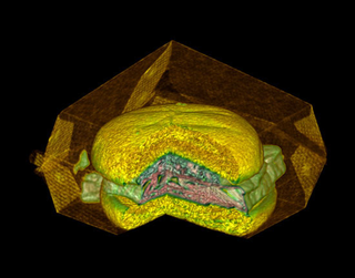 Illustration for article titled CT Scanner Bares Apple Notebook, PS3, and Big Mac to Their Core